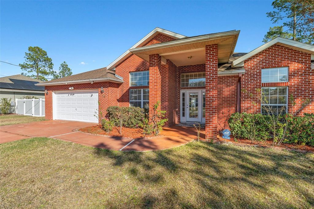 Photo of 19 Russkin Lane, Palm Coast, FL 32164 (MLS # FC315738)