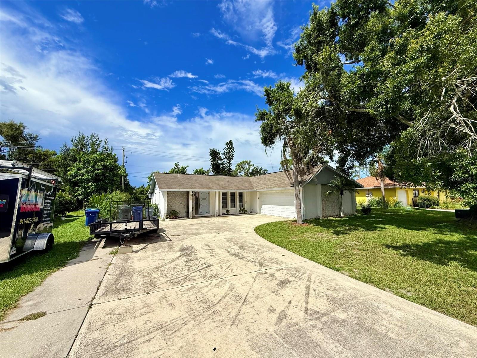 Welcome to this charming 3-bedroom, 2-bathroom home with a versatile den/flex space/4th bedroom, located in the desirable community of Ridgewood Estates in Sarasota, Florida. Nestled in a peaceful neighborhood, this residence offers a perfect blend of comfort and functionality. It is NOT in a Flood Zone, No CDD, and no HOA! The open floor plan is designed for both everyday living and entertaining, with a spacious living area that flows seamlessly into the kitchen and dining spaces. The den provides additional flexibility, ideal for a home office, playroom, or guest retreat. The primary suite features a private bathroom and ample closet space, while two additional bedrooms ensure plenty of room for family or visitors. The roof is 2019 and the AC is 2023. Outside, the fenced in, oversized backyard backs up to the Phillippi Creek. It offers a private space to relax or entertain, surrounded by the beauty of Sarasota living. Plenty of room for a pool! This home is just 20 minutes to the world-famous Siesta Key Beach, 15 minutes to vibrant Downtown Sarasota, and 15 minutes to the shopping and dining of University Town Center. This central location makes it easy to enjoy all that Sarasota has to offer!