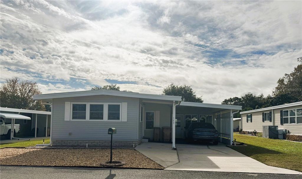 Photo of 143 Jacaranda Drive, Leesburg, FL 34748 (MLS # R4910427)