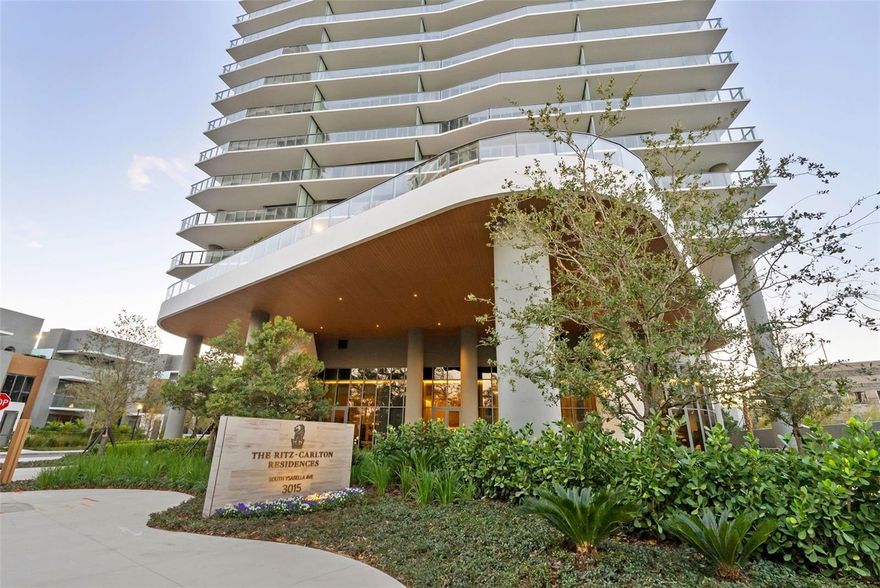 The Ritz-Carlton Residence, Tampa - Tower II Residence 2602  Just completed along iconic Bayshore Boulevard, The Ritz-Carlton Residences, Tampa - Tower II represents a new pinnacle of waterfront luxury overlooking Hillsborough Bay. This landmark address establishes an uncompromising standard for refined design, privacy and elevated living in South Tampa. Now presenting a rare opportunity to acquire the highly sought-after RAR "02" residence - the only floor plan to immediately sell out. Perched on the 26th floor, Residence 2602 enjoys an even more commanding vantage point, capturing expansive Eastern views across open bay waters and the downtown Tampa skyline. As day transitions to evening, the residence is illuminated by dramatic western sunsets, offering a full spectrum o flight and water vistas from its elevated position. Spanning 1,960 square feet, the thoughtfully designed interior features two bedrooms, two-and-a-half bathrooms, and a den or optional third bedroom with access to a full bath. Soaring 10-foot ceilings and walls of floor =to-ceiling glass create a bright, expansive atmosphere with seamless indoor-outdoor flow. Private elevator access opens to an elegant foyer, revealing a meticulously curated interior finished to the highest standards. The gourmet kitchen showcases Sub Zero and Wolf appliances, quartz countertops, and custom Italian cabinetry by ItalKraft. The appliance site includes a Wolf induction cooktop, Asko dishwasher, and an under-cabinet Sub-Zero and beverage refrigerator. Additional highlights include spacious walk-in closets, refined Kohler fixtures, and a full size Electrolux washer and dryer - all thoughtfully integrated for both function an sophistication.