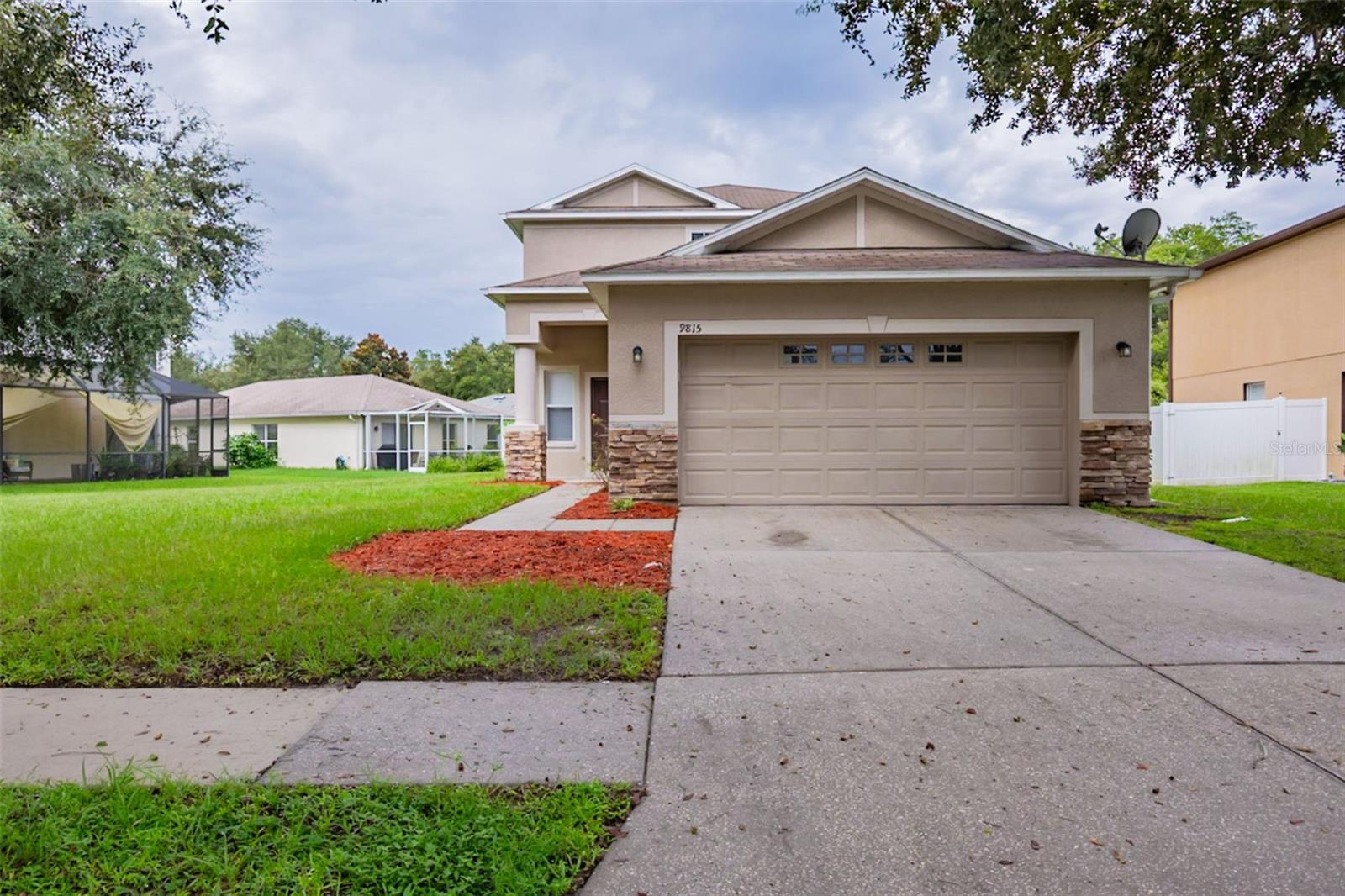 One or more photo(s) has been virtually staged. One or more photo(s) was virtually staged. This beautiful 2-story home offers 4 spacious bedrooms and 2.5 bathrooms, designed with comfort and style in mind. Enjoy the convenience of a 2-car garage and dual vanities in the bathrooms. Relax and take in serene views of the water and surrounding trees from the comfort of your home. A perfect blend of space, function, and nature awaits you here. Schedule a showing today!