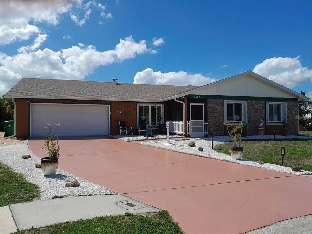 Photo of 6417 Klaus Court, Port Charlotte, FL 33981 (MLS # O6430473)