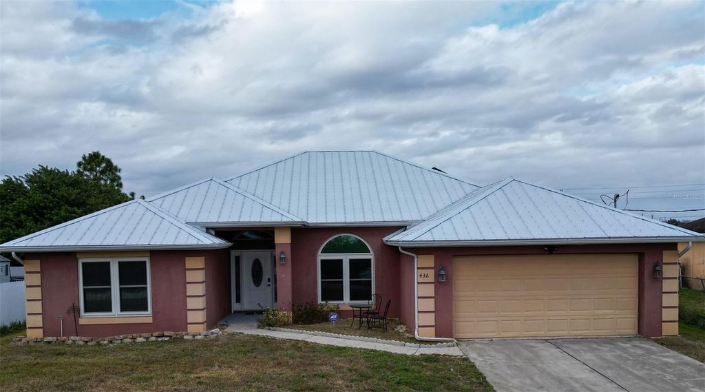 Photo of 436 Willowbrook Drive, Lehigh Acres, FL 33972 (MLS # C7520262)