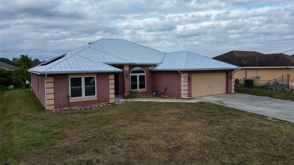 Photo of 436 Willowbrook Drive, Lehigh Acres, FL 33972 (MLS # C7520262)