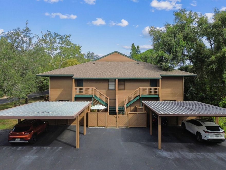Opportunity awaits with this charming 2nd-floor, 2-bedroom, 2-bath condo in the highly sought-after, tree-lined community of Glen Eagles in Palm Harbor. Nestled in a peaceful setting surrounded by lush greenery, this home offers the ideal combination of comfort and convenience. Spend relaxing days at the beautiful community pool or enjoy a friendly game on the tennis courts— all just steps from your front door. Covered carport parking with additional storage adds everyday practicality and extra space for your belongings. Inside you are greeted by a bright and open living area featuring soaring vaulted ceilings that enhance the sense of space and light. A spacious balcony, accessible from both the main living area and the primary bedroom, overlooks the tranquil natural surroundings. Perfect for morning coffee or evening relaxation while taking in the serene views. This well-maintained beauty boasts updated bathrooms and flooring. Don’t miss your chance to embrace the relaxed, picturesque lifestyle of Glen Eagles located in the heart of charming Palm Harbor. Near to dining, shopping, entertainment and all that this coastal town has to offer including easy access to the famed Gulf beaches. Schedule your private showing today!