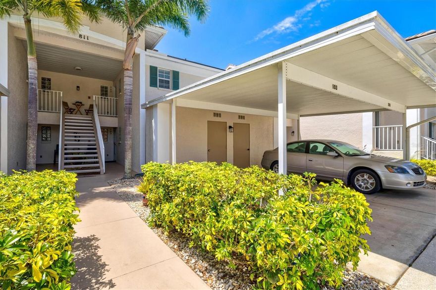Experience a peaceful, serene setting in this beautifully maintained and turnkey furnished first-floor condo located in Gardens 3 of St. Andrews at The Plantation. Offering nearly 1,300 square feet of living space, this spacious two bedroom, two bath residence features an open floor plan, abundant natural light, and stunning views of lush landscaping and the golf course beyond.

The interior is thoughtfully updated with light porcelain tile flooring throughout, a neutral color palette, and three sliding glass doors in the dining area that create a bright, airy feel while showcasing the picturesque surroundings. The kitchen is designed for both style and function, featuring white cabinetry, granite countertops, a tile backsplash, stainless steel appliances, and an island that opens to the main living space - perfect for entertaining.

The split-bedroom layout offers privacy, with a pocket door creating a private guest suite. Additional highlights include an interior laundry room, large windows for natural light, and solid concrete block construction for peace of mind.

Recent updates include a new roof and dishwasher, all new furniture, newer lighting fixtures throughout most of the home, under-cabinet kitchen lighting, an electrical panel surge protector, and upgraded granite countertops.

Enjoy maintenance-free living with a reserved carport and private storage room, ideal for bikes, beach gear, and golf clubs. One of three community pools is just steps away, and the neighborhood clubhouse is conveniently nearby.

Gardens 3 at St. Andrews is a sought-after enclave within The Plantation Golf & Country Club, where optional memberships range from dining, sports & fitness, and golf. Members have access to 36 holes of golf, tennis, pickleball, bocce, fitness, dining, and a vibrant social scene. Ideally located just minutes from shopping, dining, parks, and the YMCA, and just 4 miles from Downtown Wellen Park and 7 miles from Historic Downtown Venice – your options are endless!

Move-in ready and perfect as a seasonal retreat or full-time residence, start enjoying the Florida lifestyle today!