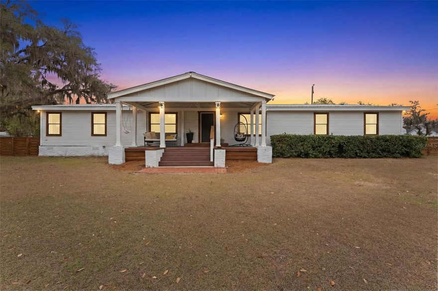 Welcome to 11040 Browning Rd — a rare opportunity to own 2.5 private acres in one of the most sought-after areas of beautiful Lithia, FL.
This exceptional property features a beautifully updated 2,000+ sq ft open-concept home, along with a separate 600 sq ft additional dwelling — offering endless flexibility and opportunity. With no HOA restrictions, you’ll have the freedom to truly make this property your own and enjoy the Florida lifestyle you’ve always envisioned. The main home offers 4 spacious bedrooms, 2 full bathrooms, and a thoughtfully designed open floor plan that seamlessly connects the inviting great room, expansive kitchen, and dining area — perfect for everyday living and entertaining alike. Ideally located just minutes from top-rated schools, shopping, and dining, convenience meets peaceful country living. Unwind in the evenings on the oversized covered front porch, where you can take in breathtaking sunsets framed by majestic oak trees. Out back, enjoy grilling on your private deck while watching wildlife roam across your wide-open yard. And if you’ve dreamed of farm-fresh eggs, you’ll love the large chicken coop that conveys with the property. Need extra space? The 600 sq ft secondary dwelling includes a bedroom and bathroom, making it ideal for a home office, guest suite, in-law quarters, income-producing rental, workshop, or ultimate retreat space. Zoned AS-1 (one home per acre), this property offers incredible flexibility — live in the existing home while building your dream house, then potentially split and sell an acre if desired. Opportunities like this don’t come along often. Schedule your private showing today and explore all the possibilities this remarkable property has to offer!