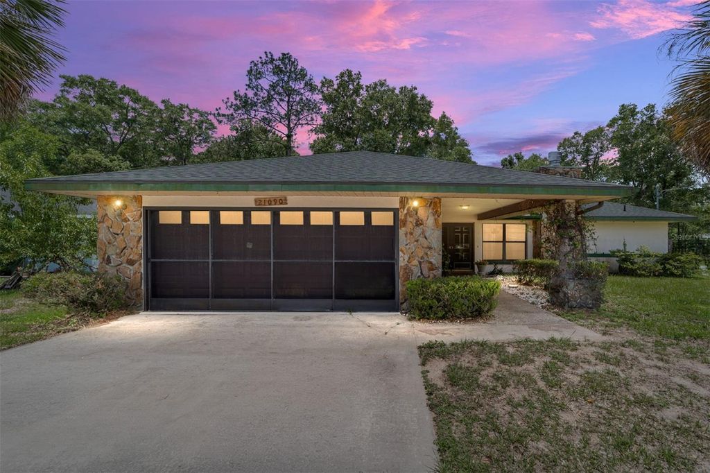 Photo of 21090 SW Peach Blossom Street, Dunnellon, FL 34431 (MLS # OM725514)