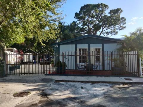 Photo of 21348 NW 40th Circle Court, Miami Gardens, FL 33055 (MLS # OM707222)