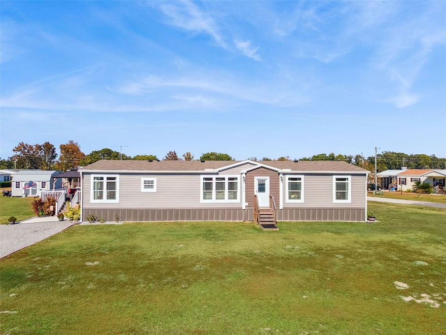 Peaceful Country Living Just Minutes from The Villages  **  Experience the best of both worlds — country tranquility and convenient proximity to The Villages! This beautiful newer 4-bedroom modular home sits on half an acre of quiet, open land surrounded by nature.  Step inside to find a light-filled, open-concept layout designed for easy living and entertaining. The bright kitchen with plenty of cabinetry flows seamlessly into spacious living and dining areas, creating an airy, welcoming atmosphere.  This home is upgraded with drywall interior walls. Enjoy the outdoors from your beautiful composite deck, perfect for morning coffee or evening gatherings. A large laundry room and extra storage shed add everyday practicality. With no HOA, you’ll have the freedom to truly make this property your own. 
** Located just minutes from the activities, shopping, and dining of The Villages, yet far enough out to enjoy peace, privacy, and starry nights — this home offers comfort, space, and the charm of country living. Located close to Lake Panasoffkee Recreation Park and minutes from the activities at Lake Panasoffkee.
**There is a vacant lot adjoining they will consider selling**