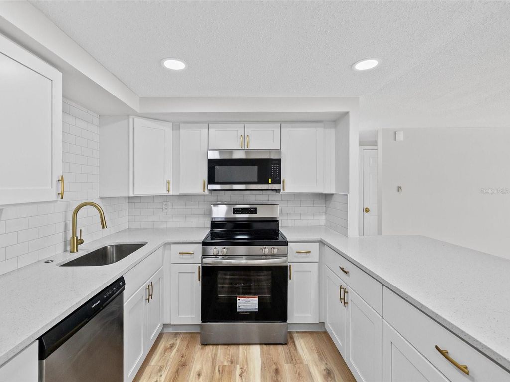 Photo of 7405 Country Club Drive, Hudson, FL 34667 (MLS # TB8428298)