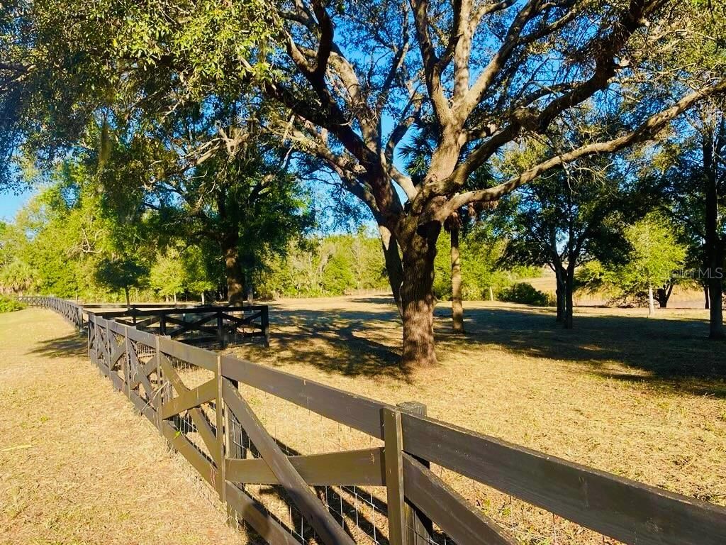 Photo of Hunters Trace Lane, Clermont, FL 34715 (MLS # TB8460650)