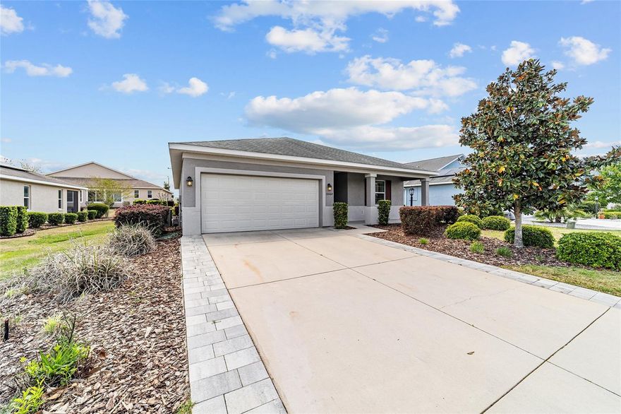 WHY WAIT FOR NEW? 2019 JULIANA MODEL IN ON TOP OF THE WORLD | QUARTZ COUNTERS | EXTENDED GARAGE | MOVE-IN READY | PRICED BELOW MARKET

Located in On Top of the World Ocala, this 2019 Juliana model offers 3 bedrooms, 2 bathrooms, and the open-concept floor plan buyers are actively searching for in today’s market. This move-in ready home shows like a model and has been impeccably maintained, making it a standout among OTOW resale homes.

The kitchen is the focal point, featuring a $15,000 upgraded quartz countertop, large center island, abundant cabinetry, and seamless flow into the living and dining areas—perfect for entertaining, everyday living, and Florida lifestyle buyers. A brand new microwave has just been installed.

The split-bedroom floor plan provides privacy for guests, while the primary suite features dual sinks, generous closet space, and a private en-suite bath. Two additional bedrooms offer flexibility for a home office, guest space, or hobby room—all highly desirable features in 55+ communities.

A key upgrade is the 4-foot extended garage, ideal for golf cart parking, extra storage, larger vehicles, or workshop space—a premium feature in On Top of the World.

Additional value: bar stools and TV convey, offering a true turnkey, low-maintenance home option.

Enjoy resort-style 55+ living in On Top of the World Ocala, featuring golf cart access to amenities, indoor and outdoor pools, fitness centers, pickleball courts, walking trails, and Circle Square Commons with dining, entertainment, and events.

This is a rare opportunity to own a newer construction Juliana model in OTOW, priced below market and positioned to attract immediate interest.