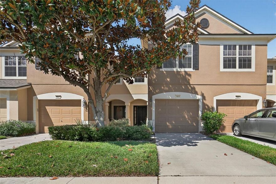 GATED SECURITY, EXTRA PRIVACY, AND SUPER CONVENIENCE! That's what you get with this 3-bedroom, 2-bath townhome with its own 1-car garage and driveway! The security is part of the appeal at Valhalla, a popular choice because of its great location where Riverview meets Brandon. Privacy is enhanced because this home's screened lanai overlooks a wooded backdrop, not another neighbor. Then there's the convenience of its spot with nearby guest parking and a side entry to the community, within minutes of shops, restaurants, commuter routes and more! Downstairs, you'll find white appliances in the kitchen beside dining and living rooms. Upstairs, 2 front bedrooms share a hallway bath while the primary bedroom in back includes a bath en suite. Your HOA fee covers Internet, water and sewer bills in addition to grounds, exterior care, and 2 neighborhood pools. You want to live here!
