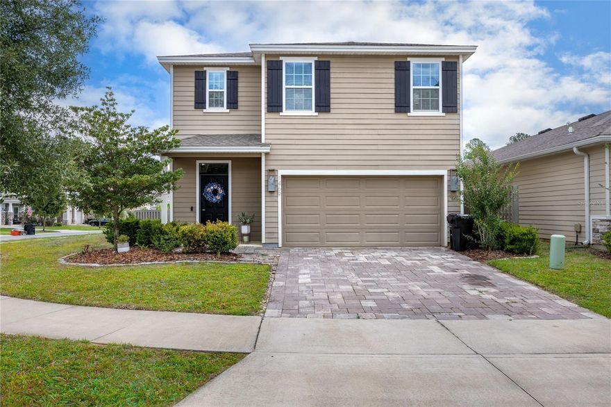 Discover the perfect blend of style, space, and functionality in this beautifully upgraded 5-bedroom, 3-bathroom home located on a desirable corner lot in Arbor Greens. Built in 2021, this two-story home offers all the benefits of newer construction with thoughtful custom touches throughout. Step inside through the welcoming entryway featuring stunning moody accent walls that set the tone for the home’s modern design. The open-concept layout seamlessly connects the kitchen, dining, and living spaces, creating the ideal setup for entertaining and everyday living. The chef-inspired kitchen is truly the heart of the home, complete with a large island, coffee bar, modern appliances, and a walk-in pantry with custom built-ins for exceptional storage and organization. A first-floor bedroom and full bathroom provide the perfect flexible space for guests, a home office, or multi-generational living. Upstairs, you’ll find an additional open living area offering even more room to relax or gather. The spacious primary suite easily accommodates a sitting area and features a large walk-in closet and an en-suite bathroom with dual vanities, a walk-in shower, and linen storage. Three additional upstairs bedrooms share a well-appointed full bathroom, while the upstairs laundry room includes custom built-in storage for added convenience. Step outside to enjoy the covered back porch overlooking the fully fenced backyard for pets, play, or outdoor entertaining. With upgraded features, versatile living spaces, and a prime location in Arbor Greens, this move-in ready home is one you won’t want to miss. Ideally located in Jonesville just minutes from Tioga Town Center, top-rated Alachua County schools, and with easy access to University of Florida, UF Health Shands Hospital, and HCA Florida North Florida Hospital. The personal touches in this home are elegant and timeless and make this home a standout, don’t miss out!