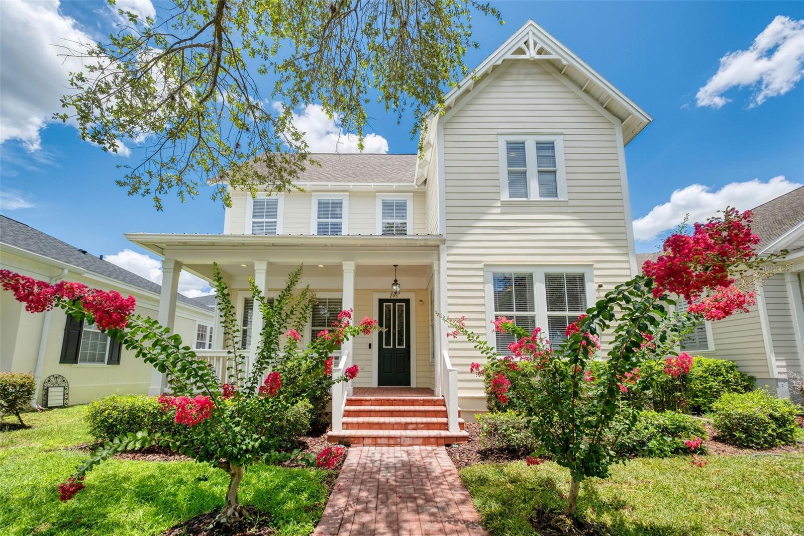 A spacious and versatile single-family residence located just steps from North Village Park and community pool/ amenities/playgrounds. This 5-bedroom, 4.5-bathroom home offers approximately 3,418 square feet of designed living space, ideal for a wide range of lifestyle needs. The inviting brick-paver front porch leads to a light-filled first floor featuring hardwood flooring, custom moldings, and flexible living spaces. The open-concept kitchen is a chef’s dream, complete with an oversized granite island, GE Monogram appliances, beverage fridge, generous IKEA sliding storage cabinets. A cozy family room with a gas fireplace, formal dining area, and private Home Office with built-ins provide ample room for work, entertainment, and relaxation. The primary suite, conveniently located on the first floor, includes dual closets (one with stacked washer/dryer), a spacious En suite bath, and access to the backyard. Upstairs, two large bedrooms share an oversized Jack-and-Jill bathroom, while a separate laundry closet provides added convenience. Outdoors, enjoy a heated pool and spa oasis surrounded by lush brick pavers. A detached pool house with full bath and kitchenette offers flexible use as a guest suite, studio, or office. Above the 3-car garage, a separate efficiency apartment with a full kitchen, washer/dryer, private entrance, and expansive second-story deck offers income potential or space to relax and entertain family and friends. Recent owner updates include 2021 ROOF REPLACEMENT, fresh interior paint, and routine maintenance to HVAC and water systems.
Located on a tree-lined street in the heart of Celebration’s North Village, residents have access to nearby parks, playgrounds, community pools, athletic fields, and scenic walking trails. With convenient proximity to FL-417, I-4, US 192, and Celebration’s shopping and dining, this home offers a rare blend of privacy, space, and community connection. At under $321/SF, this is one of the lowest priced single-family home in Celebration - don’t miss your chance to call this magical town your home! Contact your licensed real estate professional to schedule a private showing today.