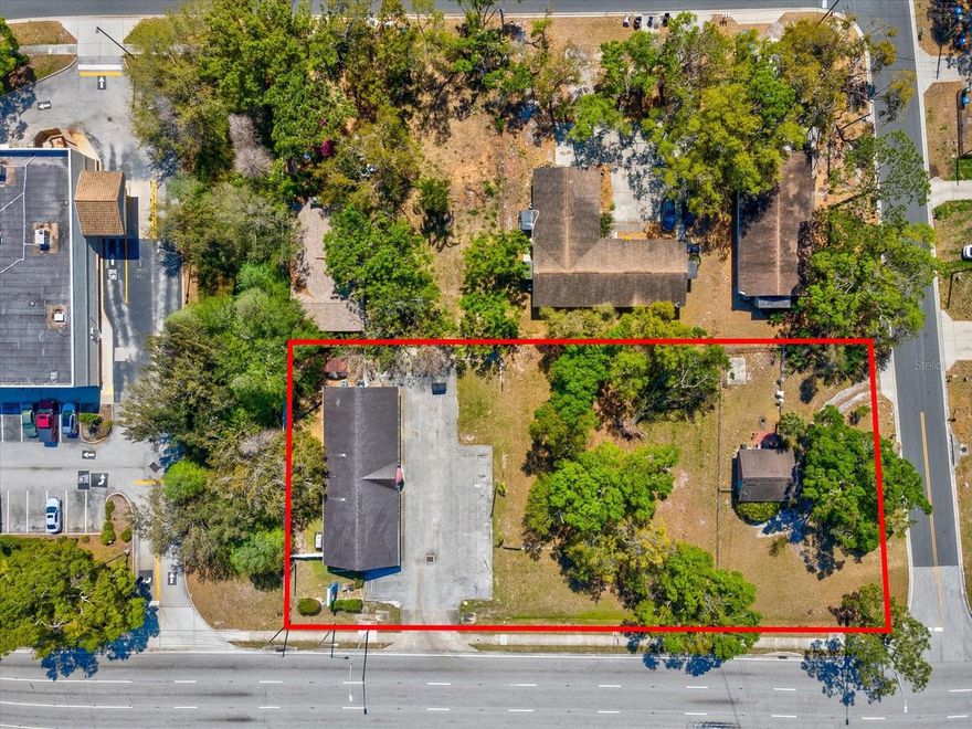 Exceptional Development Opportunity – Five Lots on Roosevelt Boulevard!

Seize this rare opportunity to acquire nearly ¾ acre of prime, high-visibility real estate along one of Largo’s most active corridors. According to the City of Largo, approximately 0.56 acres of the 0.74-acre site may support up to 28 residential units with applicable bonus density options, including incentives for affordable housing, green building, and greywater system integration.

This unique assemblage includes three parcels totaling five lots, prominently positioned at the corner of Roosevelt Boulevard and 59th Street N. Two parcels lie within the City of Largo, while the westernmost lot is located in unincorporated Pinellas County—offering flexible development potential.

The property currently features a 2,340 sq. ft. office building, a vacant lot, and an 800 sq. ft. cabin presently used as a residence. Current zoning is Residential/Office Limited (R/O-L), allowing a variety of uses including office, residential, or mixed-use redevelopment.

Strategically located next to Walgreens and across from the new 7-Eleven, this site offers exceptional exposure and accessibility. It’s minutes from St. Pete–Clearwater International Airport, with convenient access to Tampa International Airport, I-275, US Highway 19, and just 20 minutes from the Gulf beaches.

Don’t miss this outstanding opportunity to develop or invest in one of Largo’s most desirable and high-traffic commercial corridors.