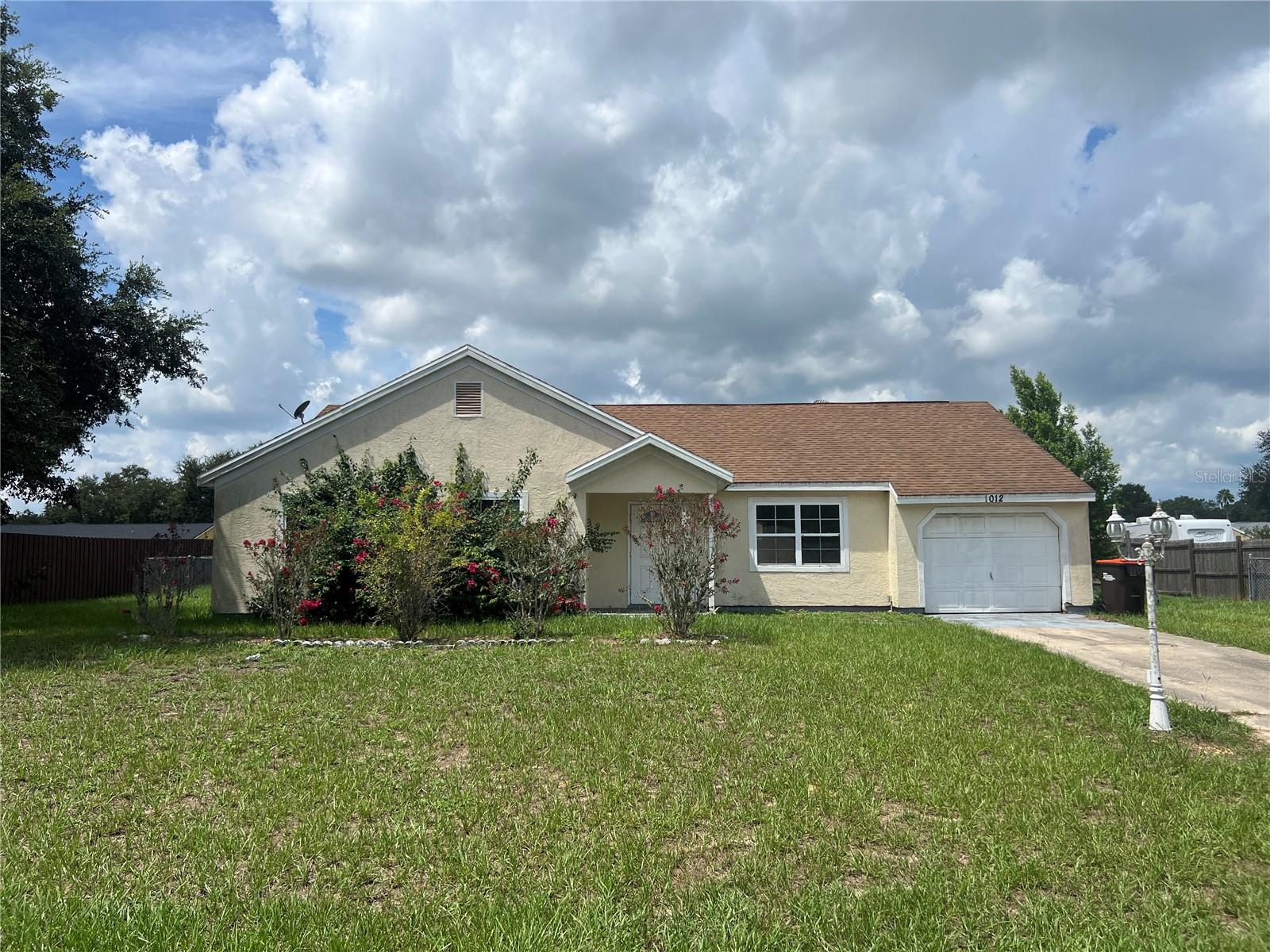 This 3-bedroom, 2-bath home is full of potential and perfect for investors or buyers looking for a fixer-upper opportunity. The layout includes a master suite with a walk-in shower, a guest bath with a tub/shower combo, and a functional one-car garage. A rear screened porch overlooks the fenced yard, ideal for outdoor living or entertaining. The detached 20x35 workshop offers excellent space for storage, projects, or conversion into a studio or additional work area.
Located close to local schools, this property has strong rental or resale potential with the right updates. Bring your vision and make it your own!