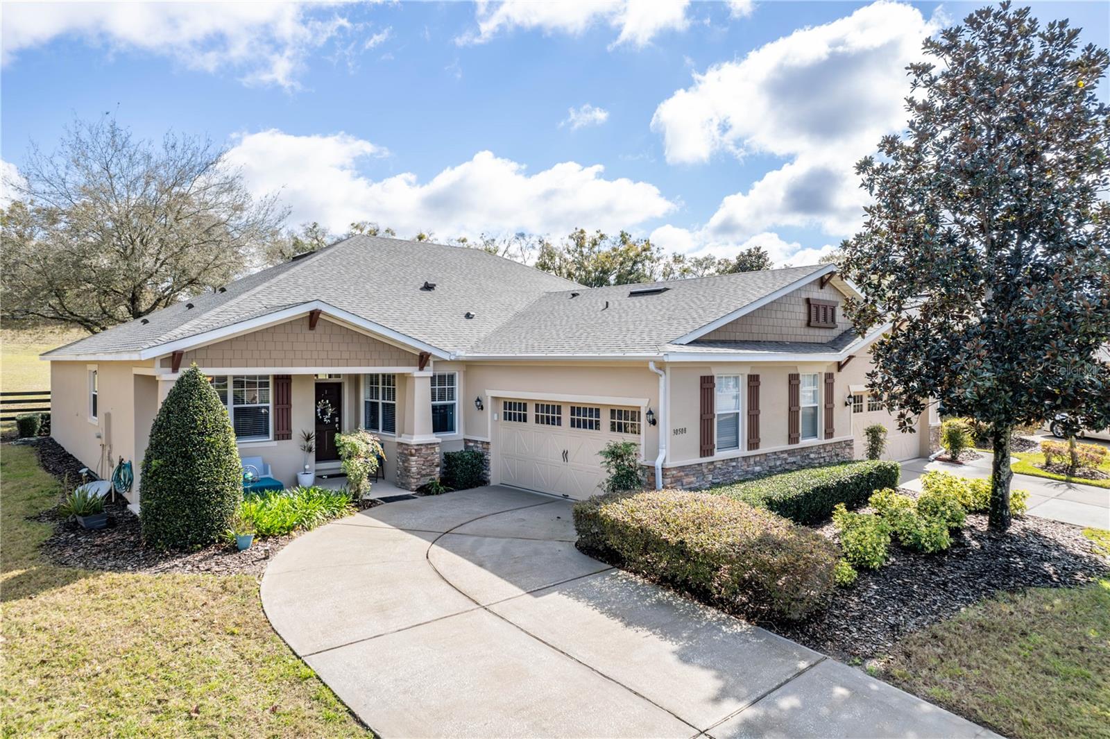 Welcome to your dream oasis in the highly sought-after gated community of Sullivan Ranch, nestled in picturesque Mount Dora, Florida. This stunning villa boasts 3 bedrooms and 2 baths, offering you a stress-free lifestyle in a vibrant gated community packed with amenities. As you step into this meticulously maintained home, you'll immediately notice the updates, including exterior paint in 2020, a new roof in December 2023 and a modern air conditioning system in July 2023 to keep you comfortable year-round. With HOA fees covering all outside maintenance (mowing, trimming, irrigation, mulch and exterior pest control) and including a new roof every 15 years and exterior paint every 5 years, you can say goodbye to the hassle of weekly upkeep and hello to the good life. Inside, the home exudes warmth and elegance with crown molding and custom window mill work adorning the main living area. The stone accent on the breakfast bar and custom backsplash elevate the kitchen's appeal, while the custom entertainment center enhances the living room's ambiance. You will enjoy the oversized master complete with a crown accent and rope lighting. With no rear neighbors, the screened porch offers a tranquil retreat to savor your morning coffee and greet the day. In the evenings, the perfectly perched west-facing front porch becomes the perfect vantage point to witness breathtaking sunsets, painting the sky with Mother Nature's stunning hues. Conveniently located just moments from downtown Mount Dora, you can easily immerse yourself in the charming hometown experience. Plus, with quick access to the 429 for commuting, you'll enjoy the best of both worlds – serene suburban living with urban conveniences at your fingertips. Don't miss your chance to experience the epitome of Florida living in this remarkable villa in Sullivan Ranch. Schedule your showing today and make this your forever home!