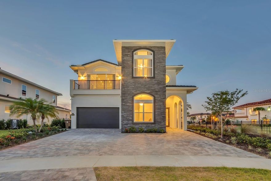 From the moment you arrive at the double-gated entrance of Bears Den at Reunion Resort, you know you've entered a different world—one where privacy meets prestige, and every detail tells a story.

This extraordinary 7-bedroom, 8-bath designer home invites you to experience resort living reimagined. Located on the largest corner lot in the community and nestled within a quiet cul-de-sac, this property offers unmatched privacy and impressive curb appeal. Step into an elegant open layout, where natural light dances across carefully curated finishes and each space flows effortlessly into the next. The gourmet kitchen, with its generous island and high-end appliances, anchors the heart of the home—perfect for entertaining or quiet morning rituals.

Venture further and discover a world of imagination: a Mario Bros. arcade bedroom pulsing with nostalgia, a Star Wars suite that transports you to another galaxy, a cozy Monsters Inc. room designed for joy, and a dedicated private theater where movie nights feel like cinematic premieres.

Upstairs, a game loft opens to a balcony that welcomes the golden Florida sunsets—an ideal spot to unwind, reconnect, or simply breathe. Outside, a heated pool, bubbling spa, and summer kitchen await under the stars, creating a seamless indoor-outdoor lifestyle.

As a Bears Den homeowner, you’ll enjoy full access to Reunion Resort’s unparalleled amenities: three world-class signature golf courses designed by Jack Nicklaus, Arnold Palmer, and Tom Watson—the largest and most prestigious golf offerings in Central Florida, tennis and pickleball courts, a water park with lazy river, exclusive restaurants, and a beautifully appointed clubhouse just steps away.

The property currently holds an active Reunion Resort membership, which gives the new owner the option to transfer and activate it through the resort's process.

This is more than a home. It’s a turnkey experience designed for those who appreciate beauty, comfort, and a powerful return on lifestyle and investment. Whether you’re building family memories or expanding your real estate portfolio, this property is ready to welcome you.

Please kindly wear the provided shoe covers upon entry, which you will find by the entrance.

<div style="padding:56.25% 0 0 0;position:relative;"><iframe src="https://my.matterport.com/show/?m=gGiJvqxWfnq&mls=1" frameborder="0" allow="autoplay; fullscreen" allowfullscreen style="position:absolute;top:0;left:0;width:100%;height:100%;"></iframe></div>