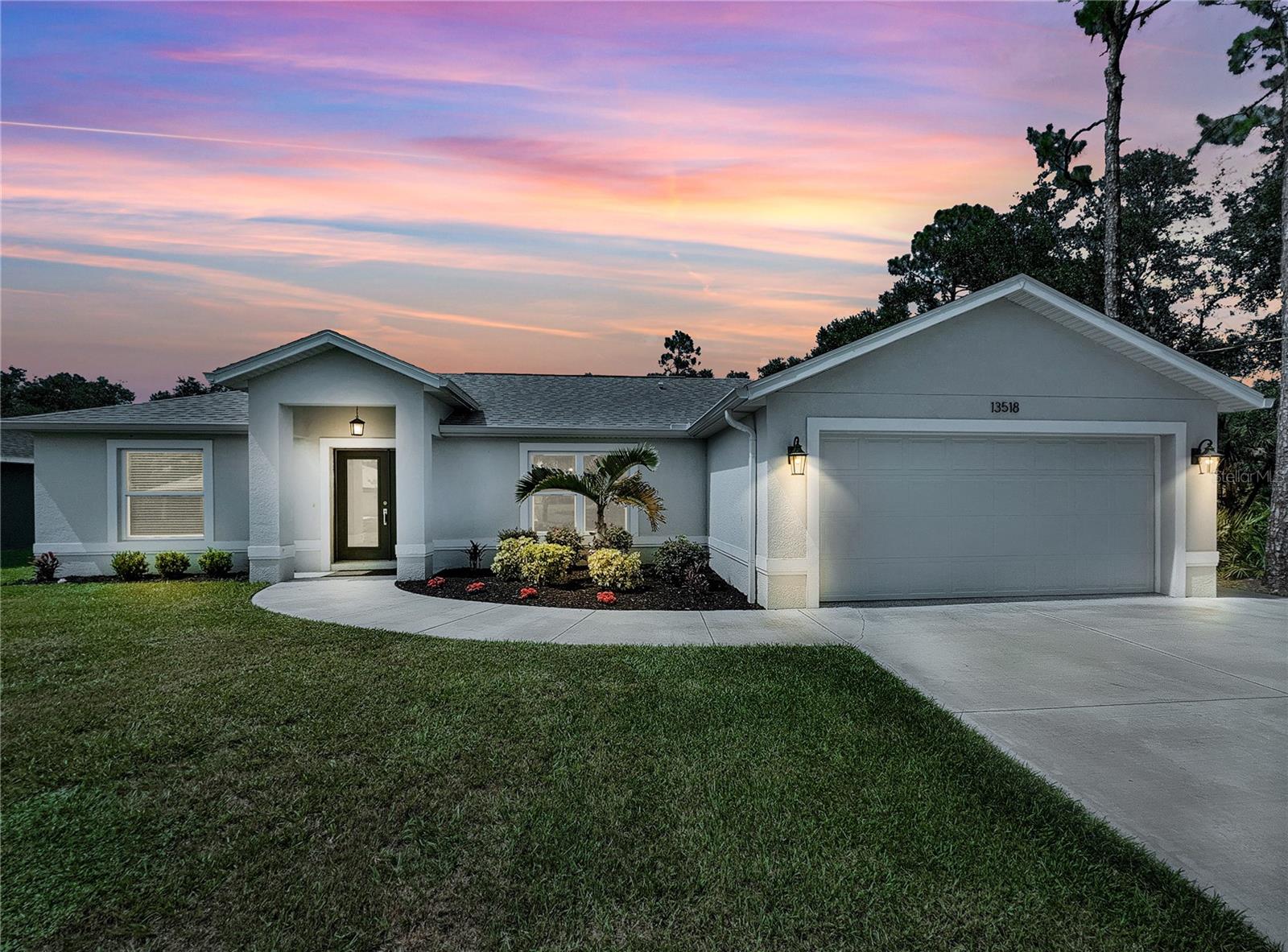 Welcome to your Florida Dream Home! This beautifully designed residence features CITY WATER, HURRINCANE IMPACT WINDOWS and a HEATED SALTWATER POOL, perfect for year-round relaxation and entertaining. Inside, you'll find an OPEN Floorplan that flows effortlessly, highlighted by custom cabinetry and stylish finishes throughout. A elegant Master bedroom that has the right amount of space with a breathtaking and BRIGHT Master Bath to accompany it. Stainless steel appliances, engineered flooring, walk-in closet, large pantry, epoxy garage flooring and custom garage shelves are just a few of the upgrades this home has! Whether you're looking for a primary residence or a vacation retreat, this home offers the the perfect blend of comfort, quality, and coastal lifestyle. Don't miss the opportunity-schedule your private showing today.