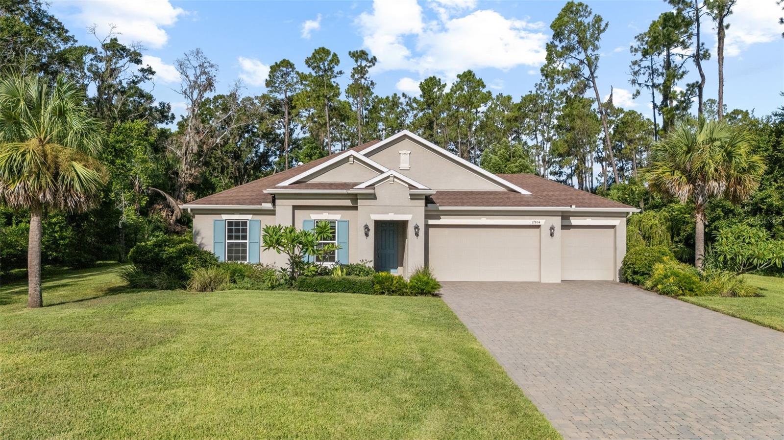 Welcome to 17804 Waterway Creek Drive — a beautifully designed 3-bedroom, 2.5-bath home built by Meritage Homes in 2018. Set on a quiet cul-de-sac in Lutz, this property spans 2.64 acres and backs up to serene conservation land with direct access to the 115-acre, skiable Lake Stemper.
Inside, you'll find 2,547 sq ft of thoughtfully laid-out living space with soaring 10' ceilings and a bright, open floor plan that effortlessly connects the living, dining and kitchen areas. The gourmet kitchen is a true showstopper, featuring stainless steel appliances, modern cabinetry, a large center island and a spacious walk-in pantry.
The primary suite offers tranquil lake views and includes a spa-like en-suite bath and an expansive walk-in closet. A versatile flex space provides the perfect spot for a home office, gym, or fourth bedroom. Noteworthy upgrades include a high-efficiency air filtration A/C system, UV-blocking double-pane windows, crown molding and integrated smart home technology.
Step outside to enjoy peaceful lakefront living with a floating dock, above-ground spa, screened back patio and beautifully landscaped grounds. Whether you're launching your boat or relaxing under the shade, this outdoor space is made for both quiet moments and entertaining. Additional exterior features include hurricane shutters, gutters, an irrigation system and a private well and septic.
Located in a gated community with easy access to major highways, shopping, and dining, this exceptional property offers the perfect mix of seclusion and convenience. Don’t miss your chance to own a lakefront retreat like no other.