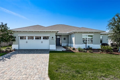 Photo of 10586 SW 98th Place, Ocala, FL 34481 (MLS # OM731055)