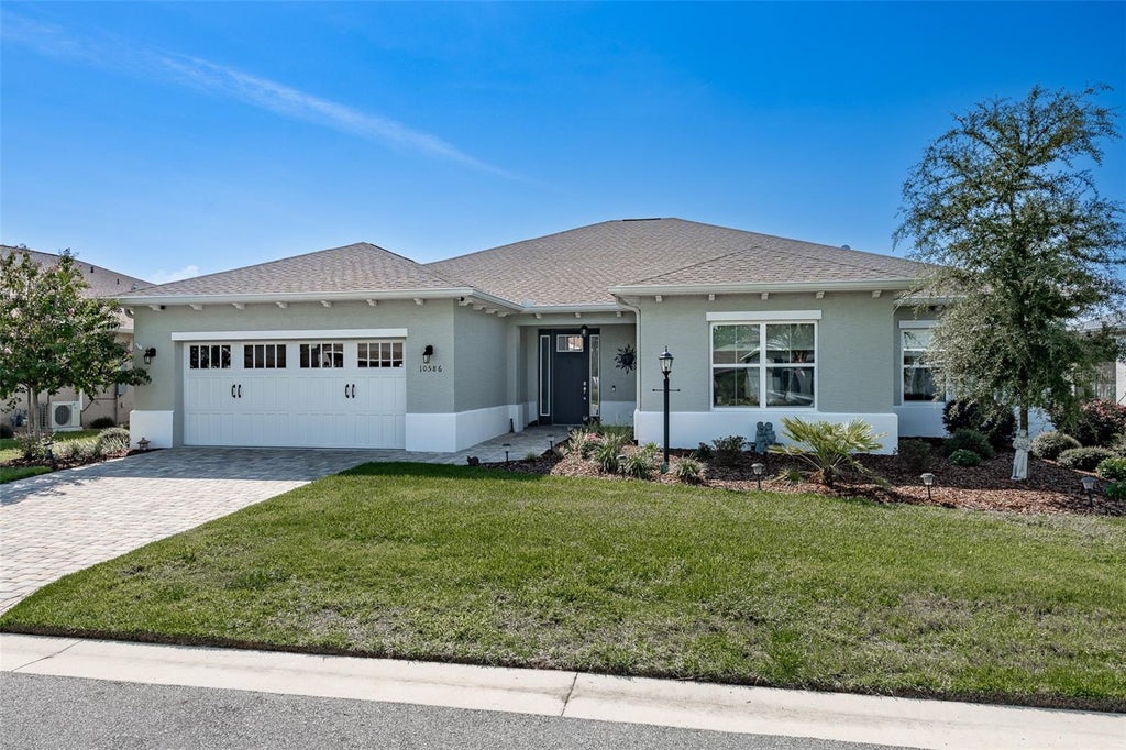 Photo of 10586 SW 98th Place, Ocala, FL 34481 (MLS # OM731055)