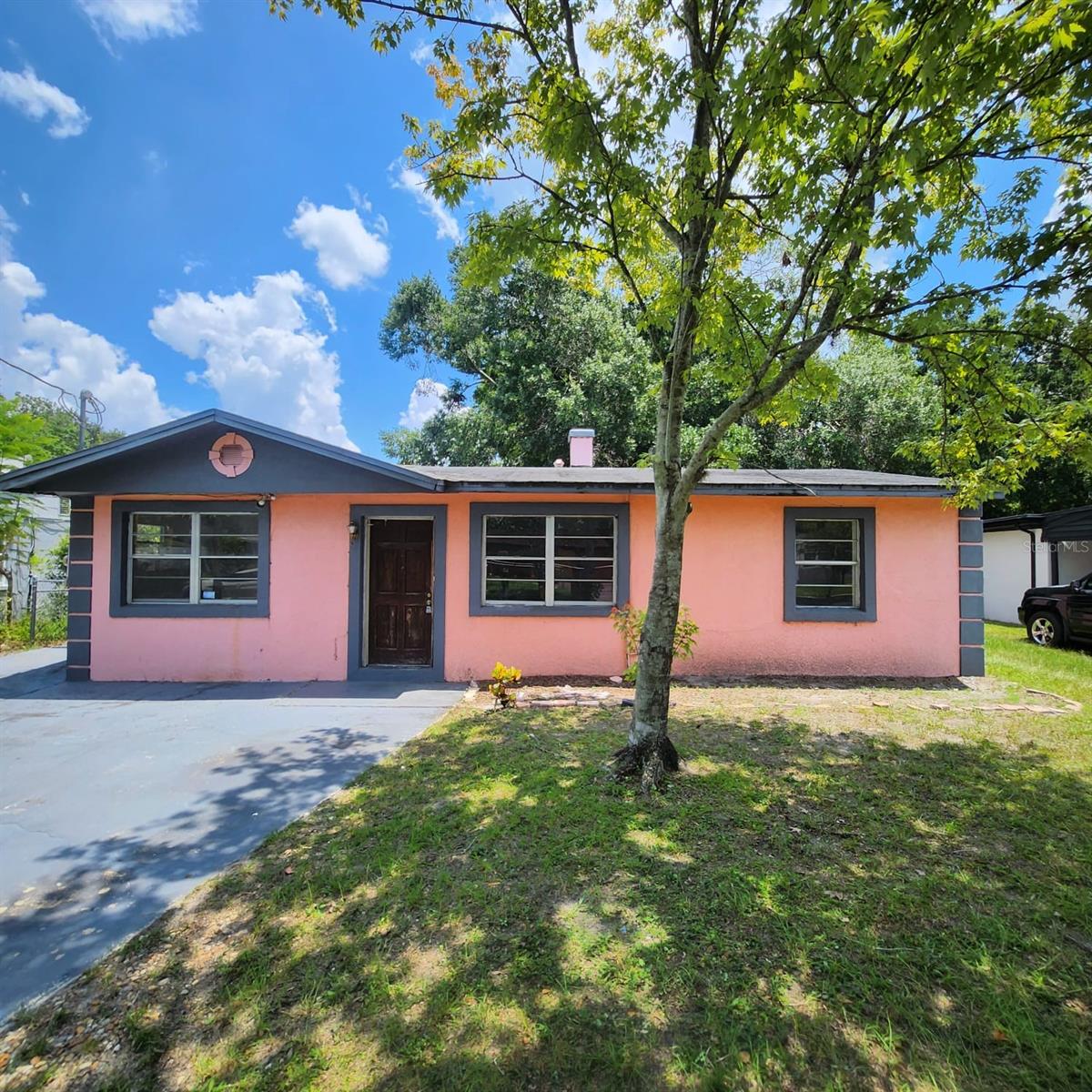 **ATTENTION INVESTORS - UNIQUE OPPORTUNITY** CASH OR HARD MONEY LOAN ONLY. 1601 Crooms Avenue has TWO SEPERATE LIVING QUARTERS CONTAINING TWO FULL KITCHENS, each one with A PRIVATE BATHROOM AND PLENTY OF PRIVACY for two separate residences under one roof! Come take a look at this RARE 3 bedroom 2 bathroom home with 1,700 + SQFT. of living space, you'll see the potential right away! Renovate and flip for a solid return in the future or rent it out and generate passive income. Located on a MATURE lot with plenty of room for improvements or additions. FULLY FENCED IN REAR YARD. The back of the home has a PRIVATE REAR GARAGE! The third bedroom features it's OWN ENTRANCE to the outside. This DOWNTOWN ORLANDO home is very close to beaches, dining, shopping and entertainment venues. This home is ready for your vision and creativity. With NO HOA restrictions, you’ll have the freedom to make this space truly your own. Don't miss out on this incredible opportunity to own a piece of land on a clean street in the HISTORIC WASHINGTON SHORES neighborhood and turn this house into a dream home or a money maker! Contact us today to schedule a private viewing. *Showings are by appointment only.*