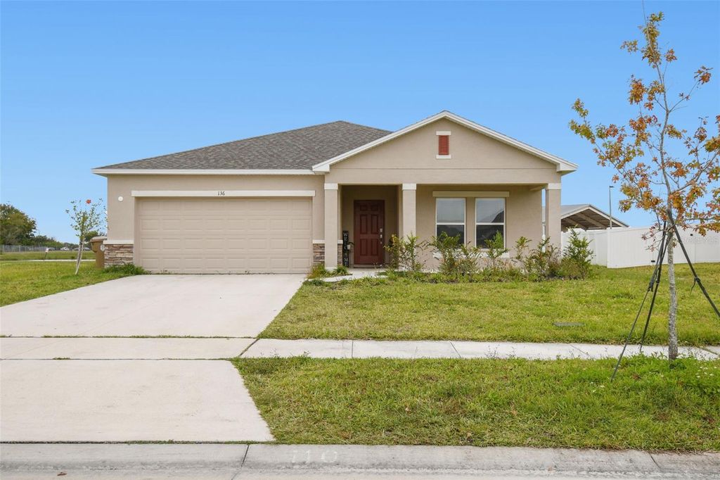 Photo of 136 Citrine Loop, Kissimmee, FL 34758 (MLS # O6359049)