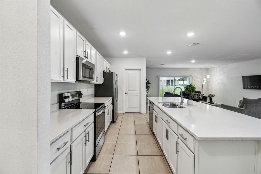 Photo of 136 Citrine Loop, Kissimmee, FL 34758 (MLS # O6359049)