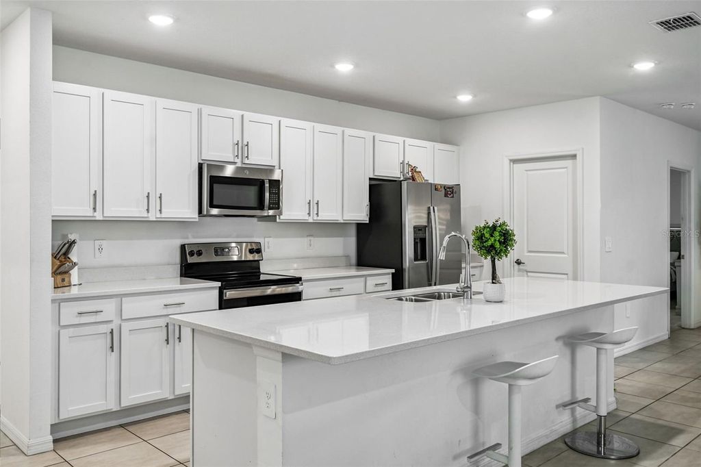 Photo of 136 Citrine Loop, Kissimmee, FL 34758 (MLS # O6359049)