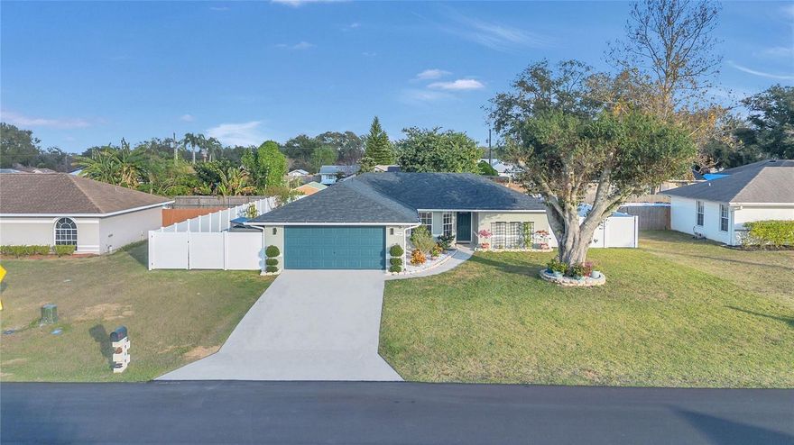 Tucked away on an oversized lot in a peaceful Lakeland neighborhood, this beautifully renovated home blends modern style with thoughtful upgrades throughout. From the moment you step inside, you’ll notice the cohesive, matching tile flooring that flows seamlessly from room to room, creating a clean and contemporary feel.

The home has been updated with a modern touch, including a refreshed kitchen and stylishly renovated bathrooms designed for both comfort and functionality. Major improvements offer peace of mind, with the home fully replumbed just two years ago and a brand-new roof completed this year.

Step outside to enjoy Florida living at its best. The screened patio provides the perfect space to relax or entertain, while the new PVC privacy fence surrounds the spacious yard—ideal for pets, play, gardening, or future outdoor additions. With no HOA, you’ll enjoy the freedom to truly make the property your own.

This move-in-ready home combines modern updates, valuable system improvements, and a generous lot—an excellent opportunity for anyone looking for comfort, style, and flexibility in a desirable Lakeland location.