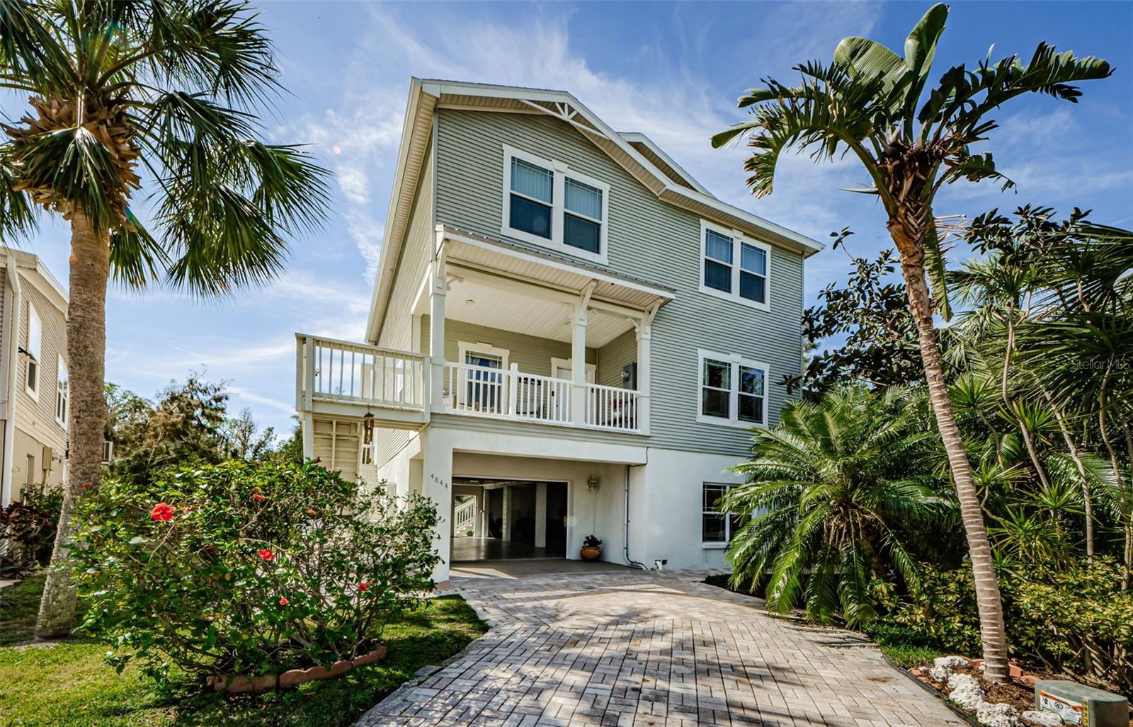 Nestled in a serene, natural setting, this beautifully upgraded 3-bedroom, 2.5-bathroom home offers a rare opportunity to live surrounded by 58 acres of preserved mangroves and mixed forest, where you can kayak directly from your backyard to Rocky Creek, Oyster Bayou, and the Gulf of Mexico. Designed across multiple levels to maximize light and views, this home invites you to experience Florida living from every angle—whether you're relaxing in the spacious Florida room, gathering around the fire pit under the stars, or enjoying the company of soaring eagles, ospreys, and wood storks. The generous primary suite features a large walk-in closet and an en-suite bath, providing a peaceful retreat. Inside, you'll find tasteful upgrades throughout, with open living spaces ideal for both quiet evenings and entertaining guests. Located in a friendly golf cart community with access to a sparkling community pool, this unique home blends privacy, natural beauty, and modern comfort—this home comes with all furnishings so it's available immediately for lease. Don’t miss this rare rental opportunity with direct access to Florida’s wild coastal beauty!