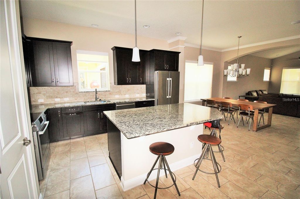 Photo of 7909 Laureate Boulevard, Orlando, FL 32827 (MLS # R4910472)