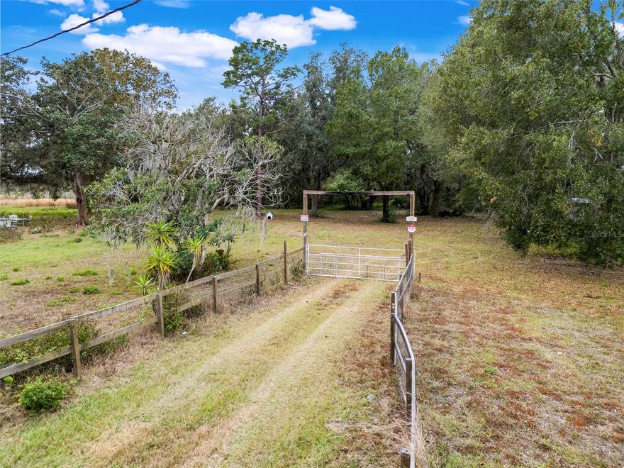 It is FINALLY here! Over 3.50 acres of beautiful, high and dry agricultural land in the peaceful Groveland countryside—ready for your vision. Fully fenced and zoned agricultural, this property invites a lifestyle with space to breathe, room for animals, and the freedom to build something truly your own. A major advantage here is that key infrastructure is already in place, including a private well with updated pump and tank, a septic system replaced within the past five years, and an upgraded 200-amp electric service with additional hookups (30-amp RV hookup)—offering a strong foundation for future plans. There is an existing home on the property that is not currently livable, presenting buyers with options: start fresh with a new build, or explore the potential of transforming the structure into a future guest house or in-law suite. Tucked away in a quiet setting yet conveniently close to Downtown Groveland, local parks, shopping, and dining—with Clermont just a short drive away—this is a rare opportunity to create a custom homestead, hobby farm, or estate-style retreat. Come walk the land, feel the space, and imagine what you could build here. Photos have been digitally enhanced to highlight the land and overall setting; the existing structure has been deemphasized for marketing purposes. This is not about what’s here today—it’s about what you can create next.