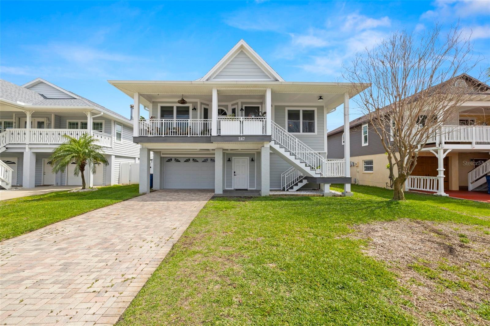 LISTED BELOW APPRAISED VALUE. This elevated coastal home in Treasure Island’s coveted Isle of Capri offers the perfect blend of quality, comfort, and location—just a short walk or bike ride to the beach. With 4 bedrooms, 2.5 bathrooms, and a layout designed for both everyday living and entertaining, the home is move-in ready with high-impact upgrades that add lasting value.
Inside, you’ll find vaulted ceilings, decorative fireplace, and an open-concept living space filled with natural light. The kitchen features stone countertops, stainless steel appliances, a wet bar, and luxury vinyl plank flooring throughout the main areas. French doors lead out to a spacious composite deck overlooking a private, heated lap pool and fully fenced backyard—perfect for entertaining or unwinding in your own tropical retreat.
The oversized garage includes epoxy flooring, ductless mini-split A/C, and ample room for a gym, golf cart, or all your beach gear. A bonus Florida room also features its own ductless A/C system, giving you extra flex space year-round. The home is equipped with solar panels, bringing the average electric bill down to just about $50 a month, and a full-house reverse osmosis filtration system ensures high-quality water throughout.
Additional upgrades include a brand-new HVAC system (2025), a newer roof (2021), and elevated block construction for enhanced durability and peace of mind. Located on a quiet street in a friendly, residential neighborhood, you’re just minutes from waterfront dining, parks, tennis courts, and local events.
The only impact from the last storm was limited to the garage drywall and has already been professionally restored. With major systems updated, beachside access, and priced below its recent appraisal, this is a rare opportunity to gain equity and enjoy the best of Florida coastal living. Showings by appointment only.