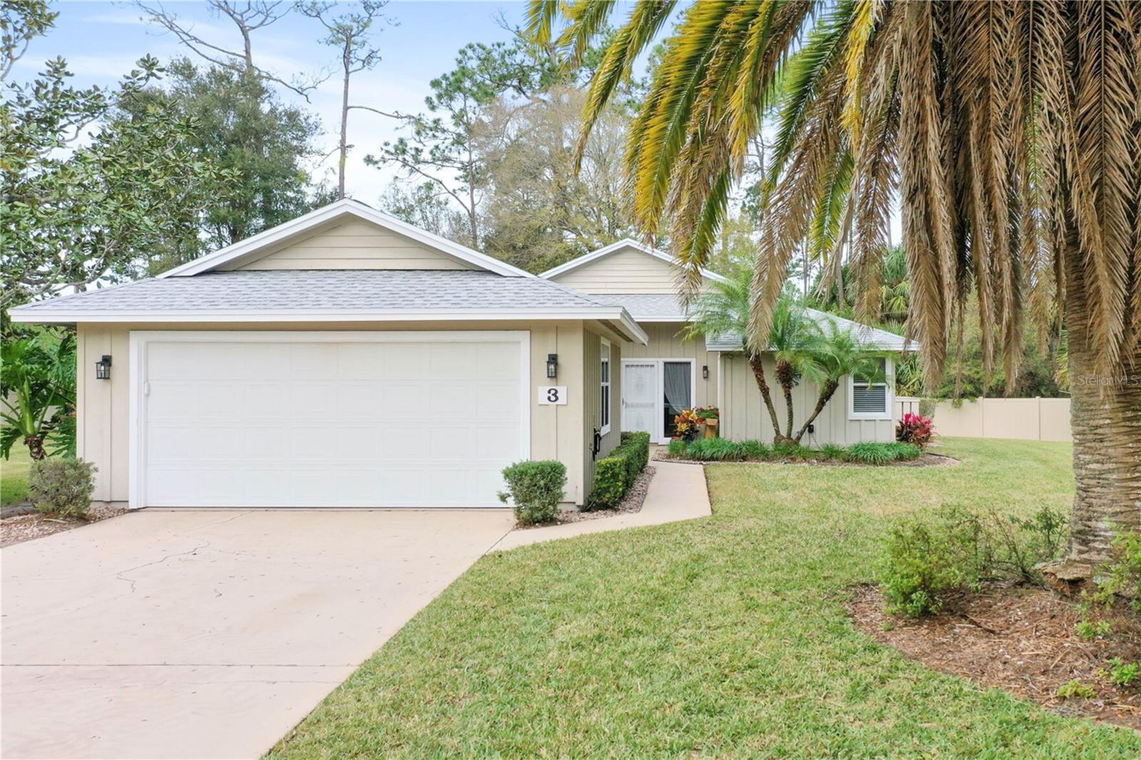 Welcome to your ideal home on Treetop Trail, located in the exclusive Plantation Bay, a gated community in Northeast Florida offering a lifestyle of luxury and leisure. Perfect for enthusiasts of golf, tennis, pickleball, fitness, or lively social events, this vibrant community provides unmatched amenities and convenience.
This home features an open, inviting floor plan with a warm entryway, designed for modern living. It includes two suites, one renovated in 2021 to be fully handicap accessible. The spacious main living area flows seamlessly into a cozy flex room and a contemporary kitchen equipped with brand-new 2022 appliances, including a gas stove. The dining area transitions into a peaceful family room with a wood-burning fireplace, leading to a serene Florida room with floor-to-ceiling windows showcasing a private, fenced backyard bordered by lush woods.
Meticulously maintained, the home boasts recent upgrades, including updated powder bathroom, a new roof and water heater installed in 2023, and new air conditioner unit in 2024. Beyond the home, Plantation Bay’s golf cart-friendly community offers 45 holes of golf and a newly built Founders Clubhouse. Everyday conveniences are close by at Roscommon Shopping Center, anchored by Publix. Enjoy scenic drives along Old Dixie Highway’s oak-lined canopy to explore historic Ormond Beach or the charming shops and restaurants of Flagler Beach, both just 15 minutes away.
Your Treetop Trail home in Plantation Bay isn’t just a place to live—it’s a gateway to a lifestyle blending luxury, recreation, and community.