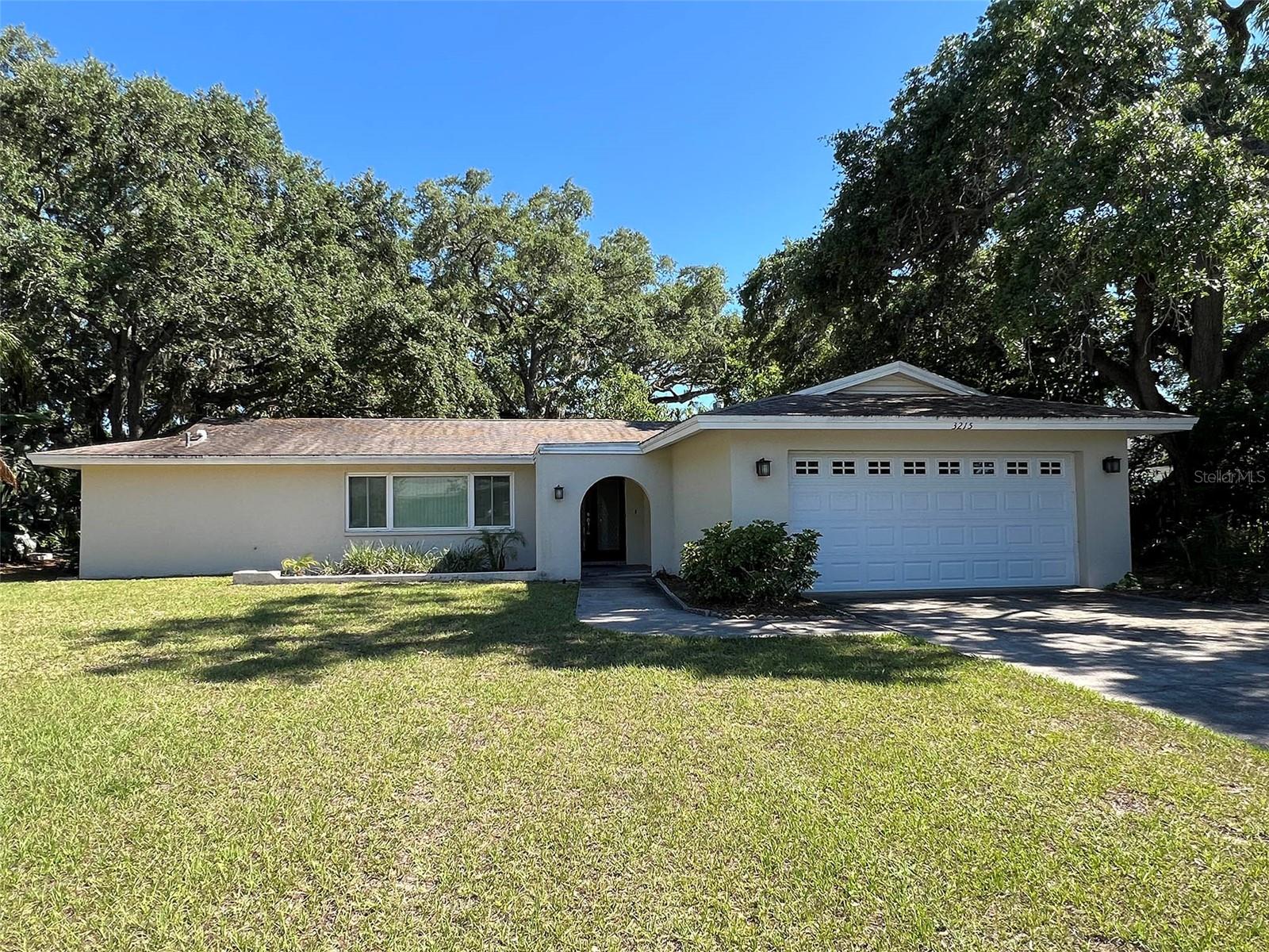 Incredible opportunity to live in the sought-after neighborhood of Del Oro Groves in Clearwater. This beautiful 3 bedroom 2 bathroom home offers a split floor plan layout. As you enter the home through the custom double door entry you'll be sure to feel right at home! The living room area is carpeted and offers an extra space off the kitchen that can be used as an office or TV area. The kitchen is located at the middle of the house and it's equipped with granite counter tops and backsplash, there is ample cabinet space and custom built-ins that serve as your pantry. The master bedroom is private and offers a spacious en-suite with His & Hers closets, double sink vanity with granite counter top and wood cabinets, walk-in shower and a separate toilet room for more privacy. The guest bedrooms are also carpeted with plenty of closet space. The guest bathroom was also updated with a double sink and granite vanity, bathtub and separate toilet room. Enjoy the privacy of the screen-in patio and tranquil setting of the backyard (all fenced-in). Save MONEY $$$ with low utility bills thanks to the energy efficient windows. Located near Bayshore Blvd, close access to Gulf to Bay, Tampa, Clearwater, minutes to downtown Safety Harbor, airport and beaches. Lawn care is included with your rent!!! This home will not last, make your appointment today!