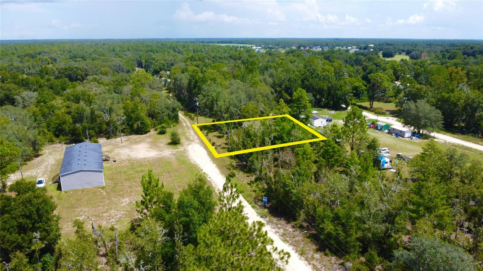 Great land opportunity for modular home or perfect place to build your dream home with country living and land privacy, great price and right off U.S. highway 27. Enough room for trailer, boat, 4-wheelers and more. 105'X108' (WXL) lot on side of a hill on a private street, free from flood zone & and no wetland, HOA & CDD free. Lot measurer 0.26 acre (+/- ) & addition 4 adjacent lots for sale separately. Minutes to Bronson and Downtown Williston 10 minute drive to town; grocery, shops and restaurants, in-between US-HWY 27 and NE 60th street.
Great local actives to visit: Horse Riding at Canopy Oak Trails or Williston Horseman's Park, Adventure into Cedar Lakes Woods and Gardens, or Dive into Devil's Den Pre-Historic Spring.
GPS Coordinates: 29.416429, -82.542748
Contact the Levy County land development/zoning and planning to discuss building specifications and confirm and use.