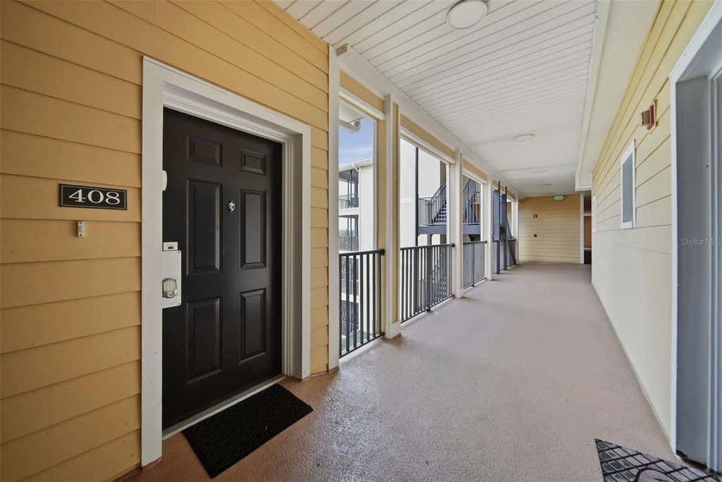 Photo of 3050 Pirates Retreat Court #408, Kissimmee, FL 34747 (MLS # O6419134)