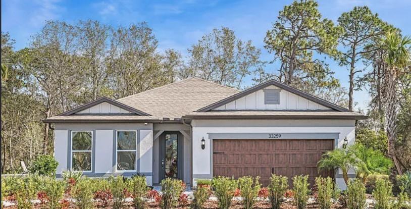 Photo of 6792 Asbury Barnes Ln, Wesley Chapel, FL 33545 (MLS # J1005532)