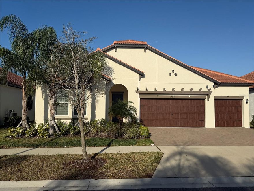 Don't miss out on this 2023 built Daybreak Model home at Medley the highly desired active adult community at Southshore Bay.  This modern open floor-plan features 3 bedrooms plus bonus flex room, 3 full bathrooms and a powder room, light tile floors in the main living areas, high coffered ceilings, light neutral paint, 3-car garage and completely fenced in yard for privacy.   The Kitchen features white 42" cabinets, quartz counter-tops, oversized island with seating for 4, gas cook-top, built-in oven, walk-in pantry and butler station.   The great room with dining area and living area have dual sliders leading to the screened in lanai.  The flex room is adjacent to the kitchen - offering you versatility of a den, an office, or family room. The primary bedroom suite is spacious and features a tray ceiling with crown molding, walk-in closet,  The ensuite owner's bathroom with dual vanity sinks, walk-in shower, large soaking tub.  Two more additional bedrooms, including a 2nd "mini" primary bedroom with bath en-suite & walk-in closet. Large laundry room complete with washer and dryer.  Bonus features include walk-up attic space offering easy, accessible storage, pavered driveway and tankless water heater.  The Medley Clubhouse is just steps away - enjoy numerous amenities such as: resort style swimming & exercise pool, indoor/outdoor dining, full service bar, pickleball, gym, billiards, organized activities and gatherings. Medley at Southshore Bay is a premium 55+ Florida resort lifestyle within a 5 acre Lagoon community.  The community offers resort style pool, exercise gym, club rooms, billiards, full bar and cafe, full time activities director and many clubs, activities and events.