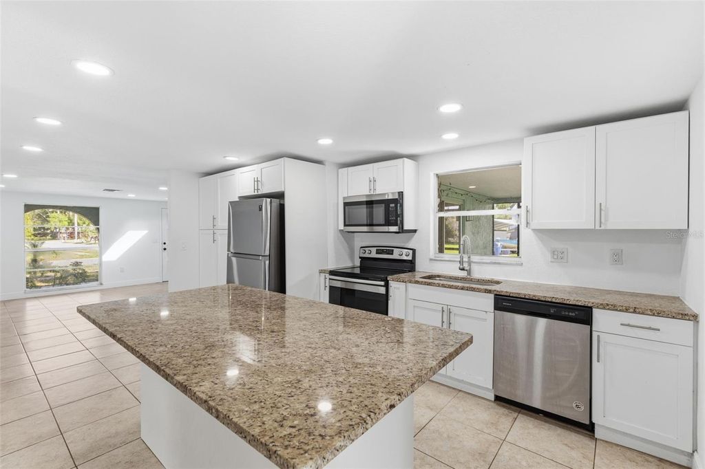 Photo of 5802 Greenwood Way, Holiday, FL 34690 (MLS # TB8471059)