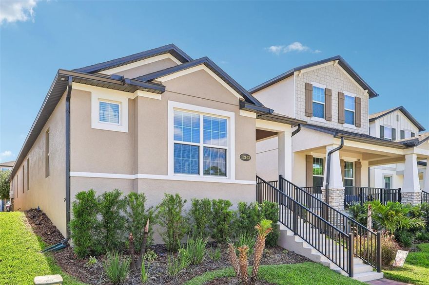 Welcome to this BEAUTIFULLY MAINTAINED 3-bedroom, 2-bath home in the highly desirable Encore at Ovation community in Winter Garden, where modern style, energy efficiency, and LOW-MAINTENANCE LIVING come together perfectly. Built in 2024, this single-story residence still FEELS BRAND NEW and currently stands out as the only home available in the neighborhood, making it a RARE OPPORTUNITY in one of Winter Garden’s most sought-after communities. From the moment you arrive, the home impresses with its beautiful landscaping, charming front porch, and EXCEPTIONAL CURB APPEAL. The HOA even includes LAWN AND LANDSCAPE MAINTENANCE, allowing you to enjoy a carefree lifestyle in this walkable community. Step through the elegant GLASS-PANELED FRONT DOOR into a bright and inviting open-concept layout where the Living Room, Dining area, and Kitchen flow seamlessly together beneath SOARING CATHEDRAL CEILINGS. Windows throughout the home fill the space with ABUNDANT NATURAL LIGHT, enhancing the airy and welcoming atmosphere while STYLISH TILE FLOORING throughout the main living areas adds both beauty and easy maintenance. The bright designer Kitchen is the heart of the home, featuring white cabinetry, quartz countertops, a FARMHOUSE SINK, stainless steel SAMSUNG APPLIANCES, a gas stove, closet pantry, and a spacious breakfast bar, creating the perfect space for entertaining or everyday living.The thoughtfully designed SPLIT-BEDROOM FLOOR PLAN offers both comfort and privacy. Tucked away at one end of the home, the Primary suite serves as a peaceful retreat, featuring a spacious walk-in closet and a BEAUTIFULLY DESIGNED EN SUITE BATH with dual sinks, a step-in shower, and a linen closet. On the opposite side of the home, two additional bedrooms each feature their own WALK-IN CLOSETS and share a full bath, making them ideal for guests, family, or a home office. Conveniently located near the primary suite, the Laundry Room comes complete with STORAGE CABINETRY, washer, and dryer for added functionality. Step outside to enjoy the COVERED SIDE PATIO with paver stone flooring, a perfect private space for morning coffee or evening relaxation. A private entrance from the patio leads directly to the REAR-FACING GARAGE with EPOXY FLOORING, preserving the home’s charming streetscape and curb appeal. Residents of Encore at Ovation enjoy OUTSTANDING AMENITIES, including a sparkling resort-style pool, clubhouse, fitness center, dog park, playground, included internet service, and LAWN AND LANDSCAPE MAINTENANCE—creating a true resort-inspired lifestyle. Located in Winter Garden, this home is JUST MINUTES from Walt Disney World Resort, making world-class entertainment, dining, and shopping incredibly convenient. You’ll also enjoy EASY ACCESS to Hamlin Town Center, featuring popular restaurants, boutiques, movie theaters, and waterfront dining, as well as NEARBY GOLF COURSES, nature trails, and MAJOR ROADWAYS for commuting throughout Central Florida. Zoned for TOP-RATED SCHOOLS and offering a perfect blend of modern design, ENERGY EFFICIENCY, and low-maintenance living, this exceptional Encore at Ovation home is an incredible opportunity to enjoy the very best of the Winter Garden lifestyle. Call and schedule your tour today!