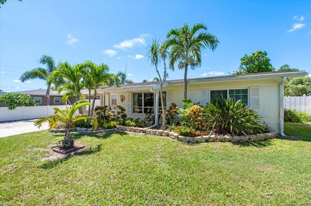 Can you say perfectamundo? To quote Happy Days, schedule an appointment to see this great 2/2 in the Tropical Shores neighborhood because it is practically “perfectamundo” in so many ways! Tropical Shores is a little-known sweet spot in Sarasota, boasting a boat friendly neighborhood, with no deed restrictions and a charming old Florida feel. The house features original terrazzo floors, a very comfortable floorplan, and stainless-steel appliances. The home is very move-in-able, with opportunities to update and make it your own! Outdoors you will find a covered porch for alfresco dining as well as a small, screened porch for morning coffee or evening beverages. The property also has a large shed that is included to store your jet skis, golf cart, bikes or whatever your heart desires! Maybe even an art studio!? A lovely back yard with an amazing Mangrove tree and a hidden water feature also has plenty of room to play or build a pool.
Tropical Shores Civic Club, includes a private marina, a convenient boat launch ramp, and a Clubhouse exclusively for RESIDENTS ONLY. Membership is only $75 annually. Ramp access is $300 annually, with limits on the size of boats that can launch, a dock slip is $1,200 annually (There is currently a waiting list). And the Clubhouse fee is $150 per event. The distance from the boat ramp to open water is lickity-split! Don’t “sit on it”, cruise on over and check this 50’s special out, you will really dig it! 1738 Colleen will be a great address for all of your future Happy Days!