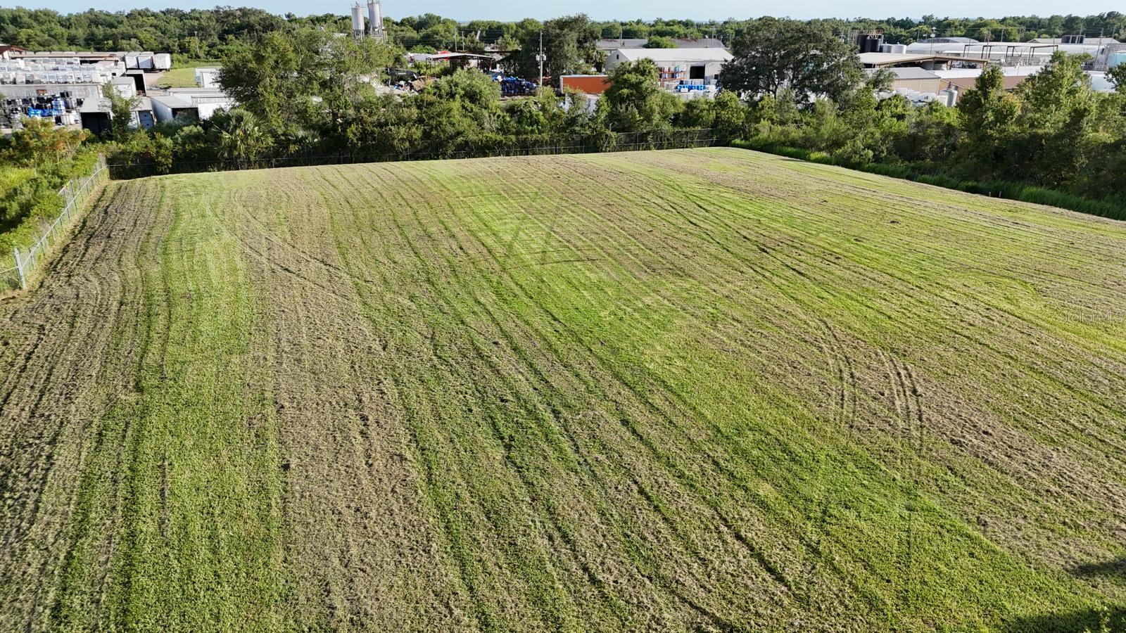 Excellent industrial opportunity in Mount Dora! This 1.99-acre lot is cleared, level, and fully fenced with metal fencing, ready for development. Zoned IND-4/Industrial, suitable for a wide range of industrial or commercial uses, with quick access to US-441 and SR-46, offering strong connectivity to Apopka, Orlando, and other key Central Florida markets. Just minutes from FL-429 Expressway. Invest in a strategic location with growth potential.
