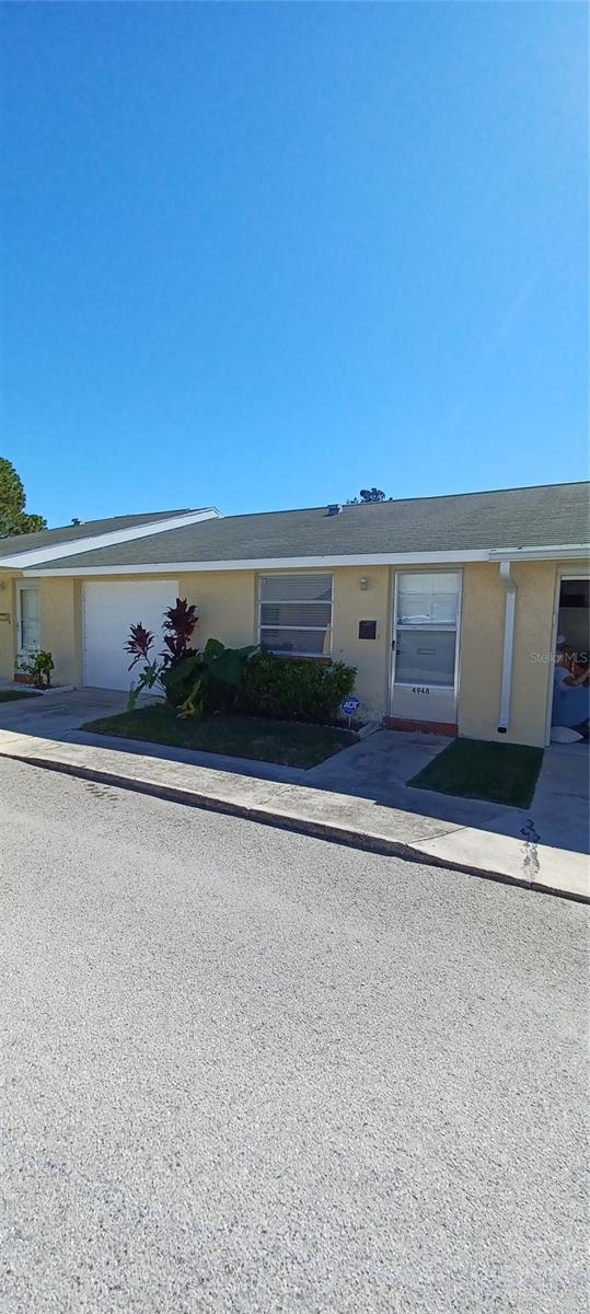 Welcome to this beautiful 2 bedroom, 1 bath villa with an attached single car garage. This is a 55+ community.  It is conveniently located, close to store , market and bank. Unit was flooded during the last hurricane, owner has restore the unit. The bathroom was beautifully done. Seller will replace stove. You can enjoy the community pool on a hot day. The association fee include all water, sewer, trash pickup, outside maintenance, lawn care and roof. You also have the option of having a private beach access by joining the Beach Club for a fee. There is also a community center which is currently under renovation.