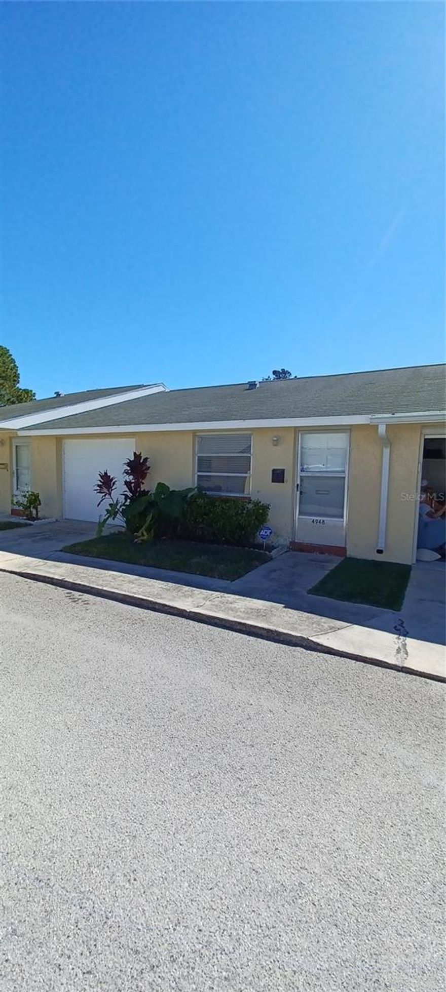 Welcome to this beautiful 2 bedroom, 1 bath villa with an attached single car garage. This is a 55+ community.  It is conveniently located, close to store , market and bank. Unit was flooded during the last hurricane, owner has restore the unit. The bathroom was beautifully done. Seller will replace stove. You can enjoy the community pool on a hot day. The association fee include all water, sewer, trash pickup, outside maintenance, lawn care and roof. You also have the option of having a private beach access by joining the Beach Club for a fee. There is also a community center which is currently under renovation.