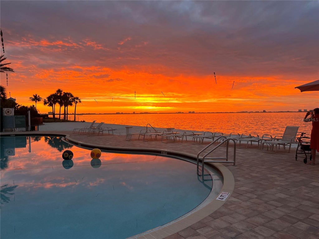 Photo of 4991 Bacopa Lane S #202, St Petersburg, FL 33715 (MLS # TB8560893)